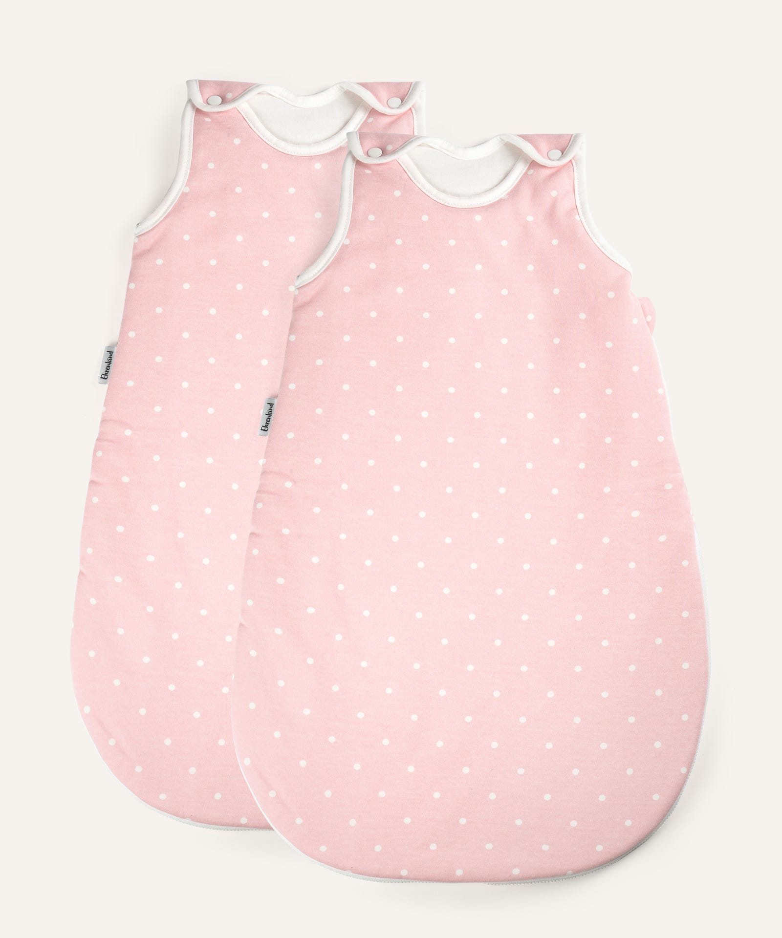 2er Bundle Ehrenkind Baby-ganzjahresschlafsack rund rosa mit weißen Punkten.