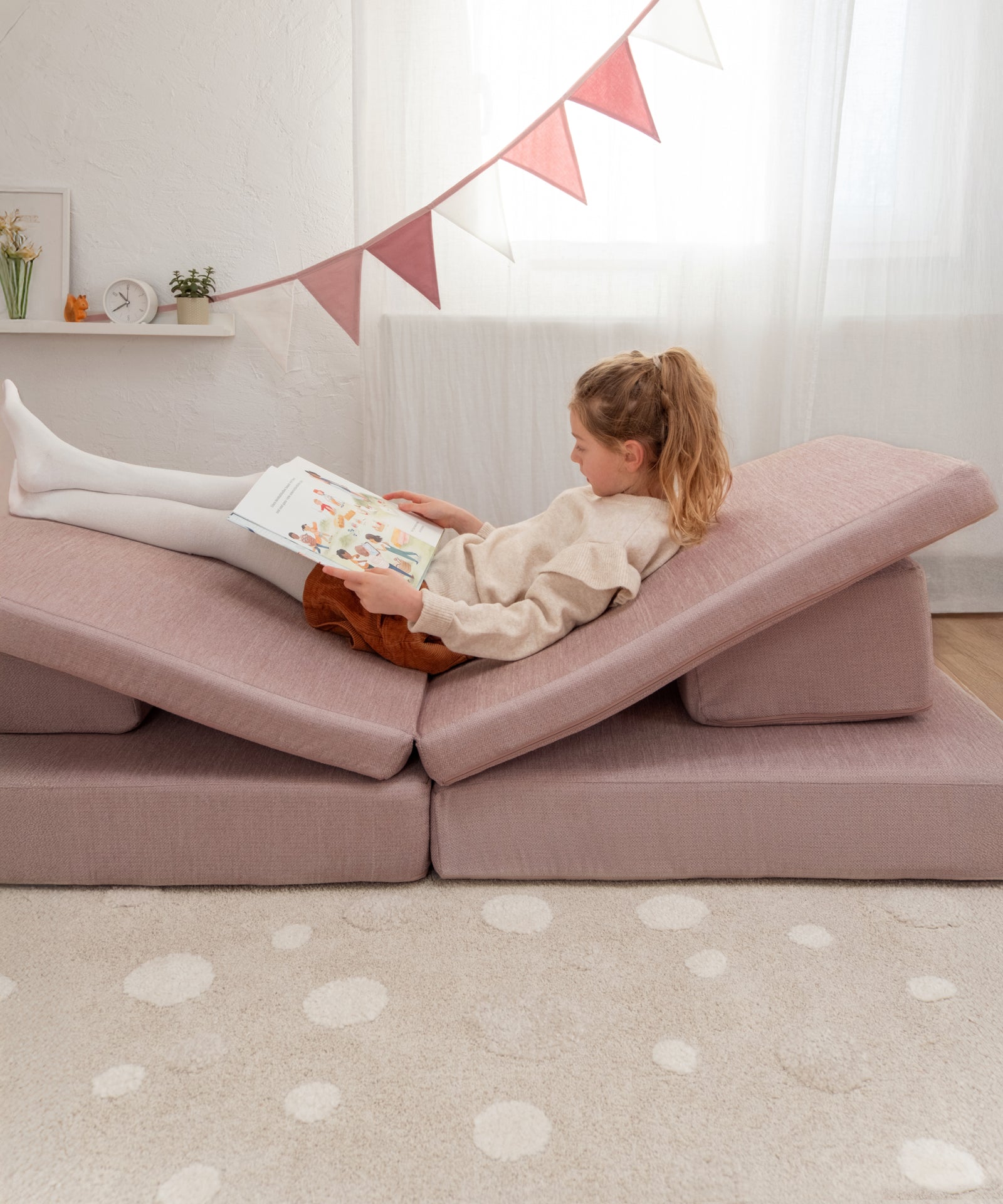 Spielsofa als gemütliche Leseecke.